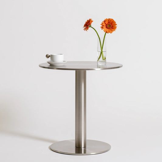 Table sur pied central en métal, coloris argenté